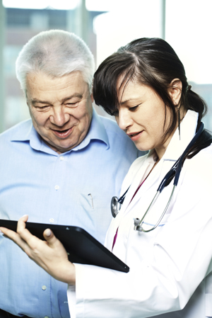 Female-Doctor-with-Tablet.jpg Female-Doctor-with-Tablet.jpg